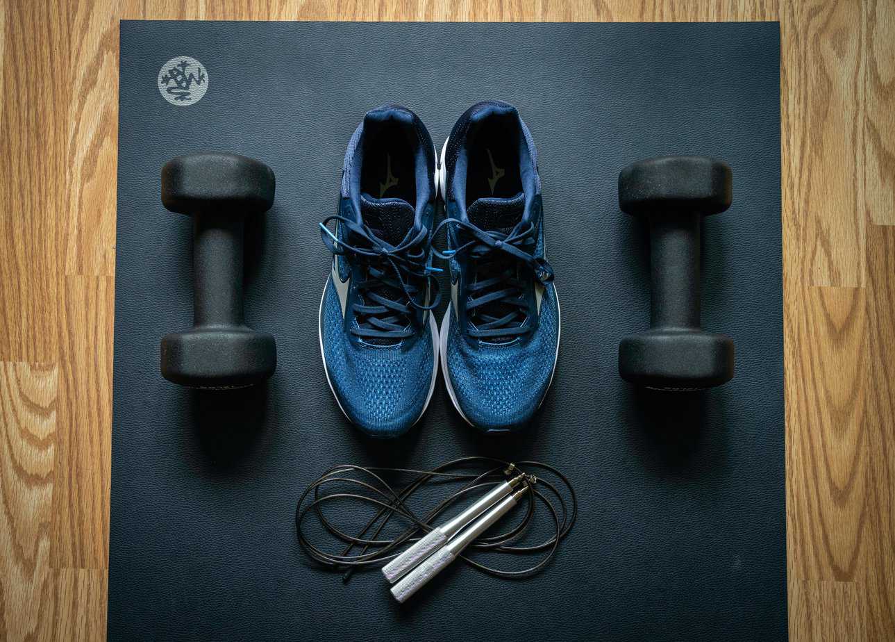exercise equipment on black yoga mat