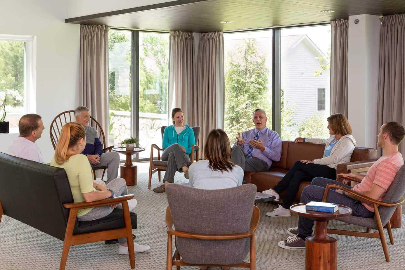 Group therapy session addressing substance abuse in a community space at Mountainside Treatment Center