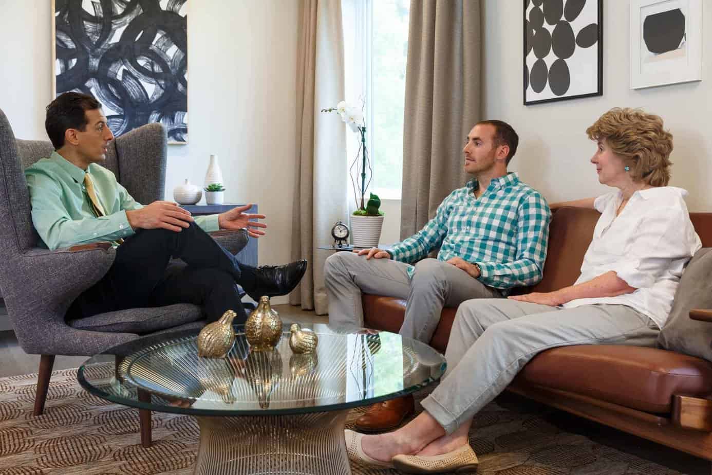 Mother and Son Meeting with Therapist in Counseling Room in Mountainside Treatment Center