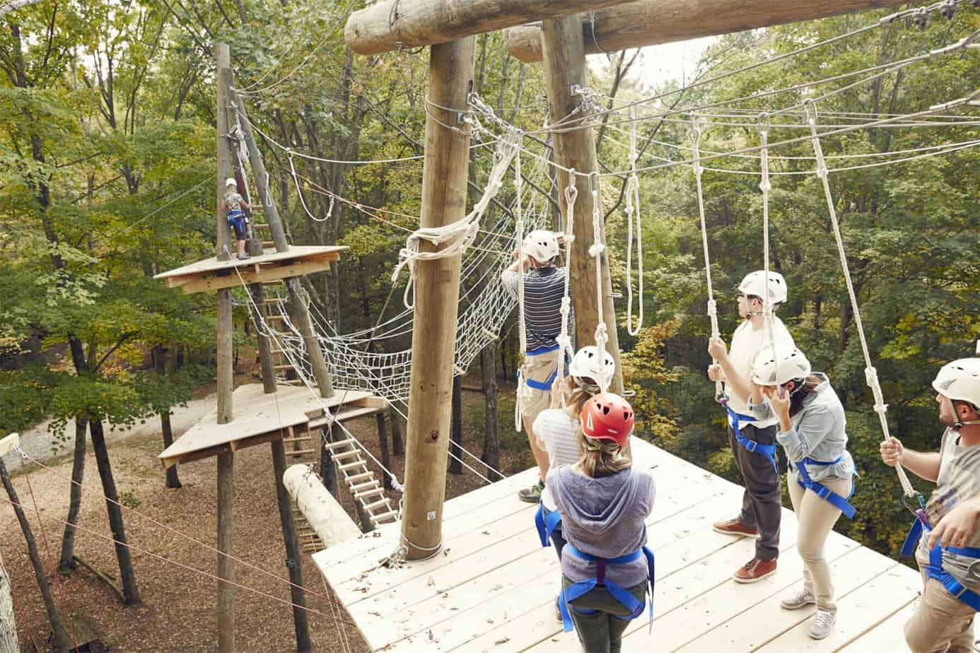 people participating in a ropes course during adventure-based therapy at Mountainside Treatment Center in Canaan CT