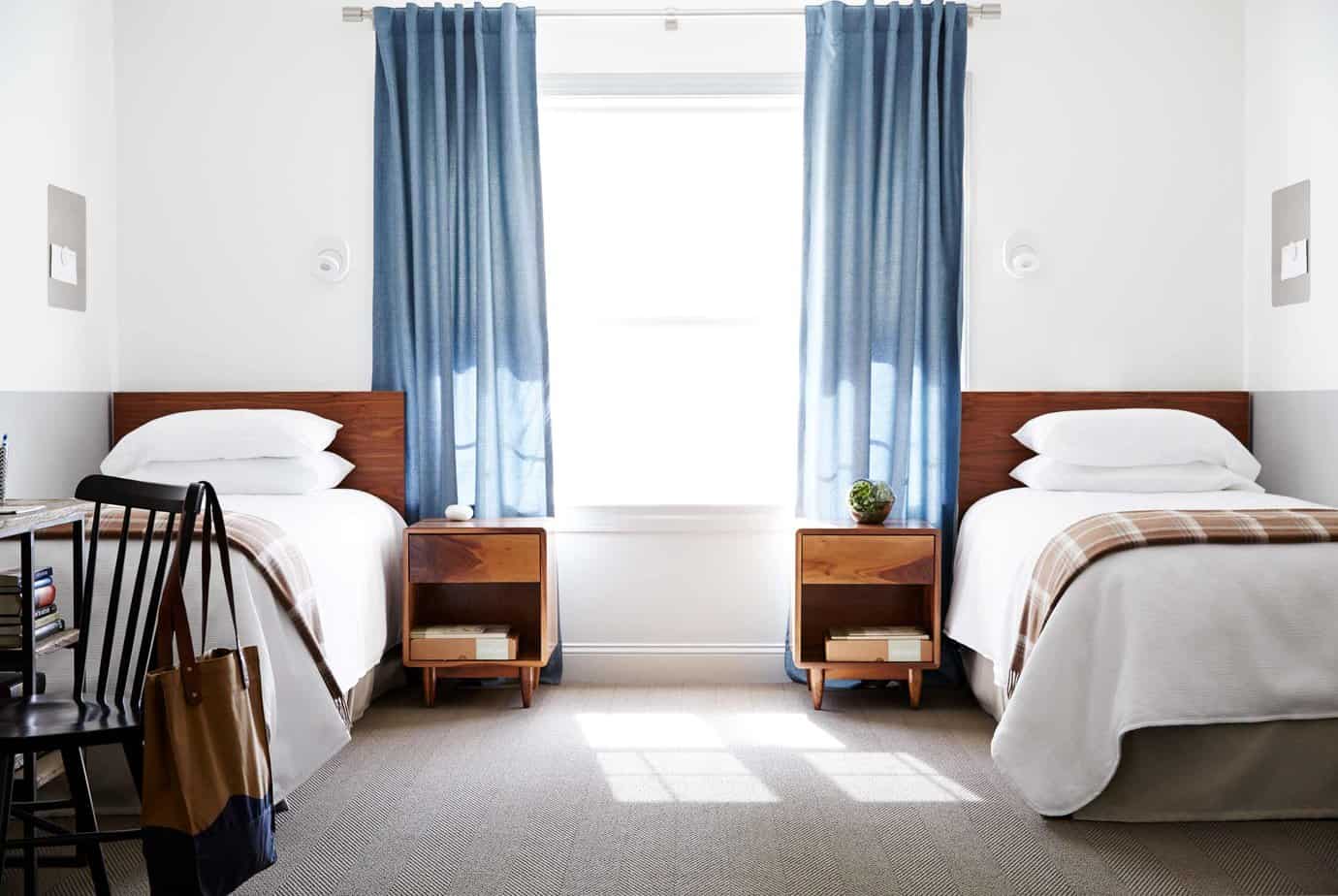 A beautiful light-filled bedroom suite with contemporary design at Mountainside treatment center.