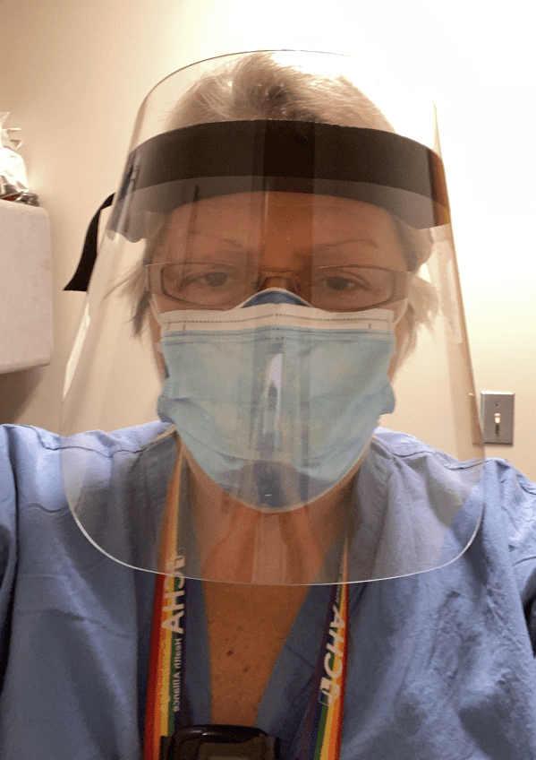 man in healthcare field wearing protective equipment PPE