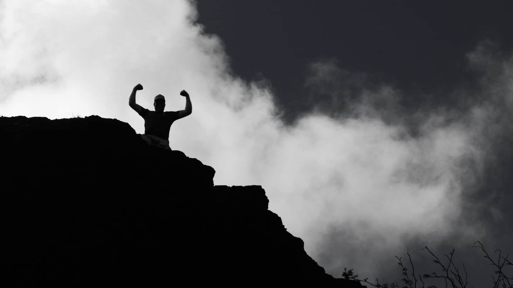 Man on Mountain in Shadow