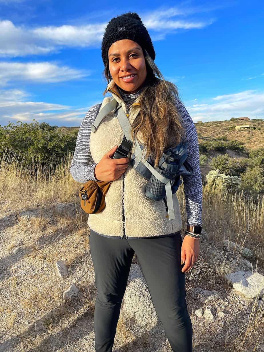 woman standing in field on sunny day