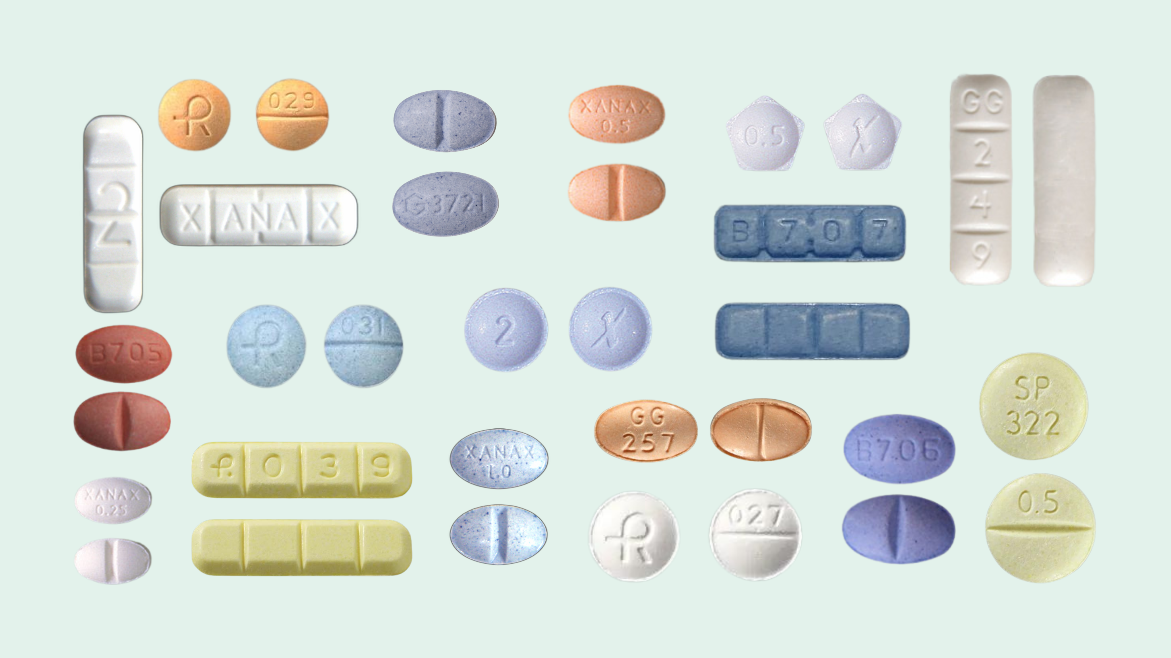 images of xanax pill variations. white bars of xanax, blue bars of xanax, yellow bars of xanax, xanax footballs, white xanax pills, red xanax pills, orange xanax pills.