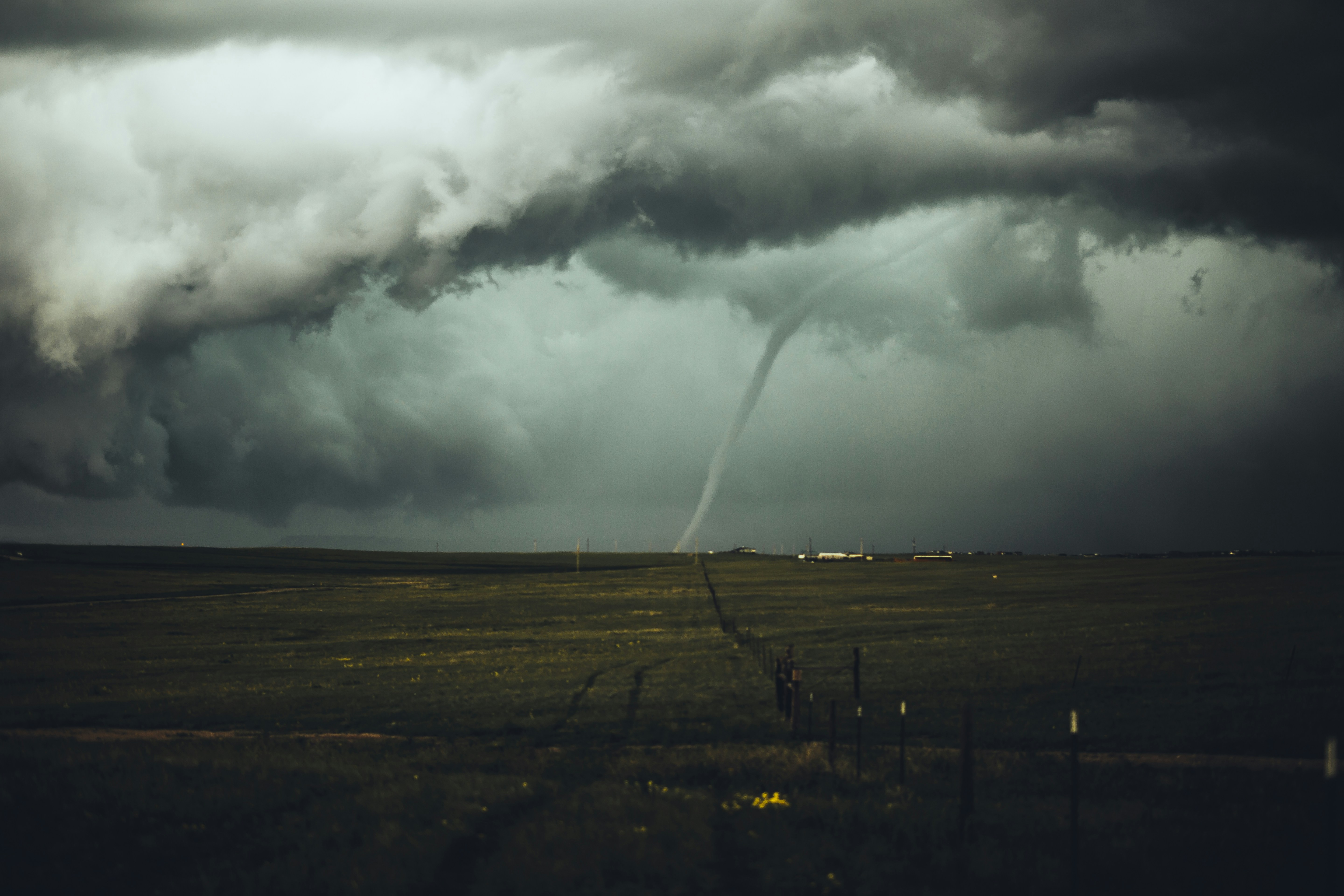 tornado begins to touch down in a rural area